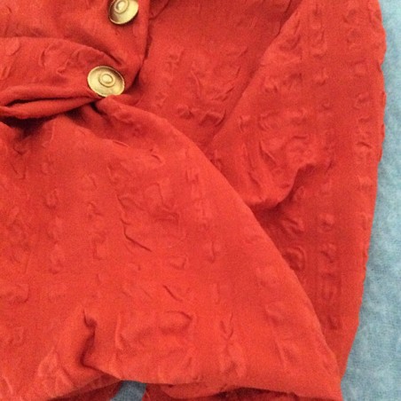 Tissu cloqué laine et coton orange capucine à relief gaufré infroissable pour veste et rideaux