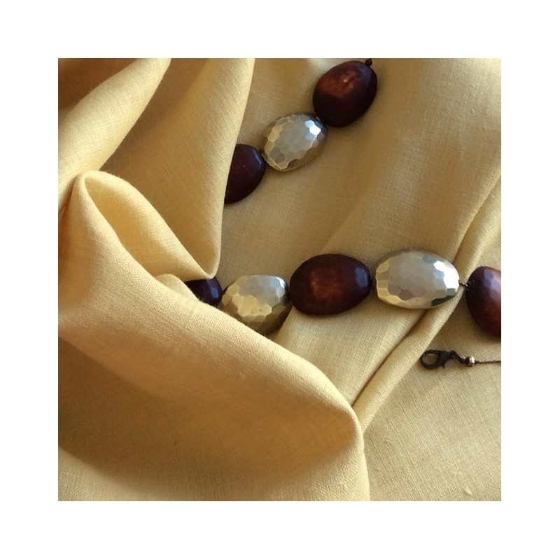 Tissu toile lin et polyester jaune paille texturé pour couture de robe et rideaux plombants