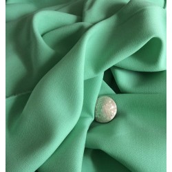 Tissu crêpe vert menthe en laine