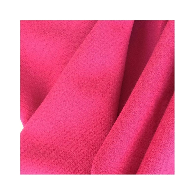 Tissu uni crepe de laine fuchsia