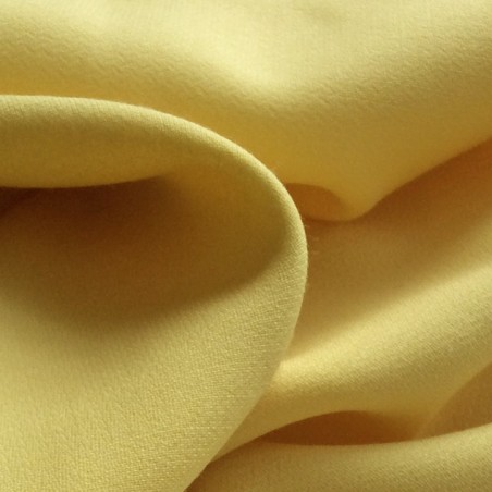 Tissu crepe envers satin en laine jaune